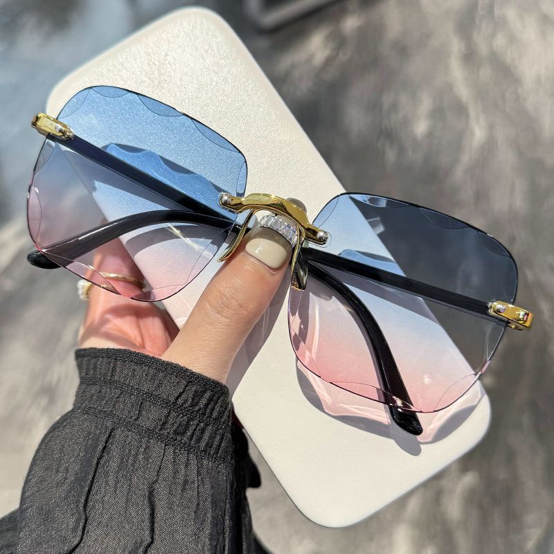 Rimless cut edge sunglasses Internet celebrity trend sunglasses women's fashion i korean version UV protection too
Male glasses