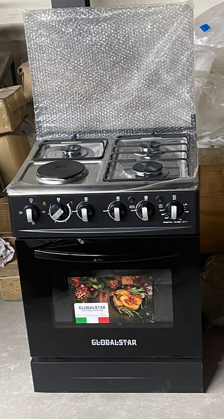 GLOBALSTAR 60*60 JET 3+1 STANDING COOKER  BLACK & WITH ELECTRIC OVEN.
