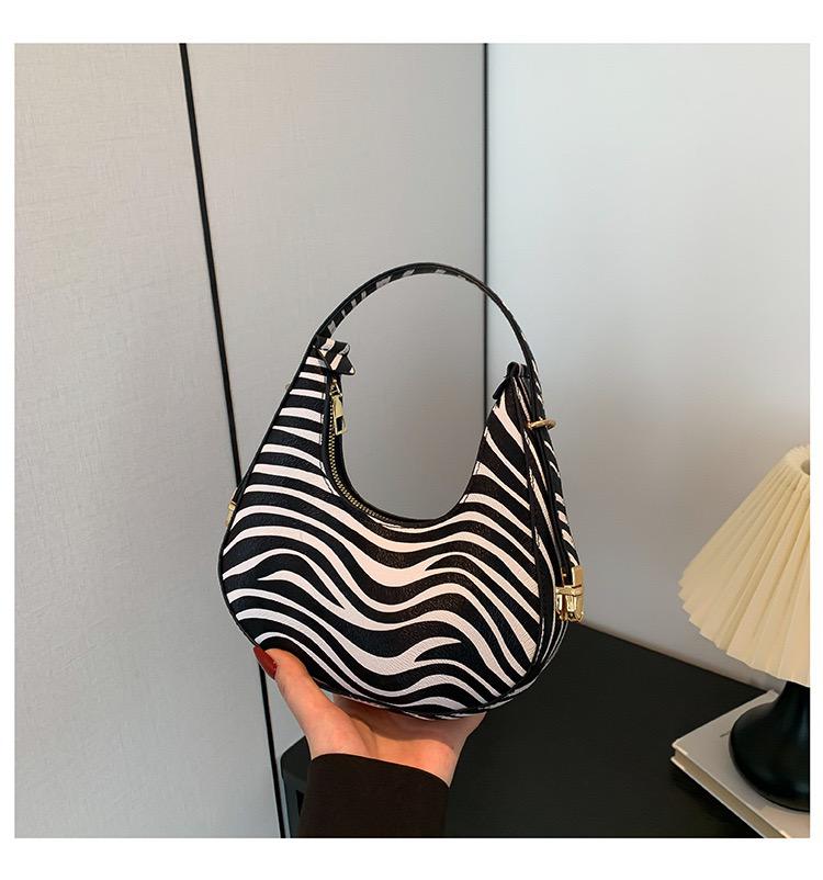 Animal print statement bag