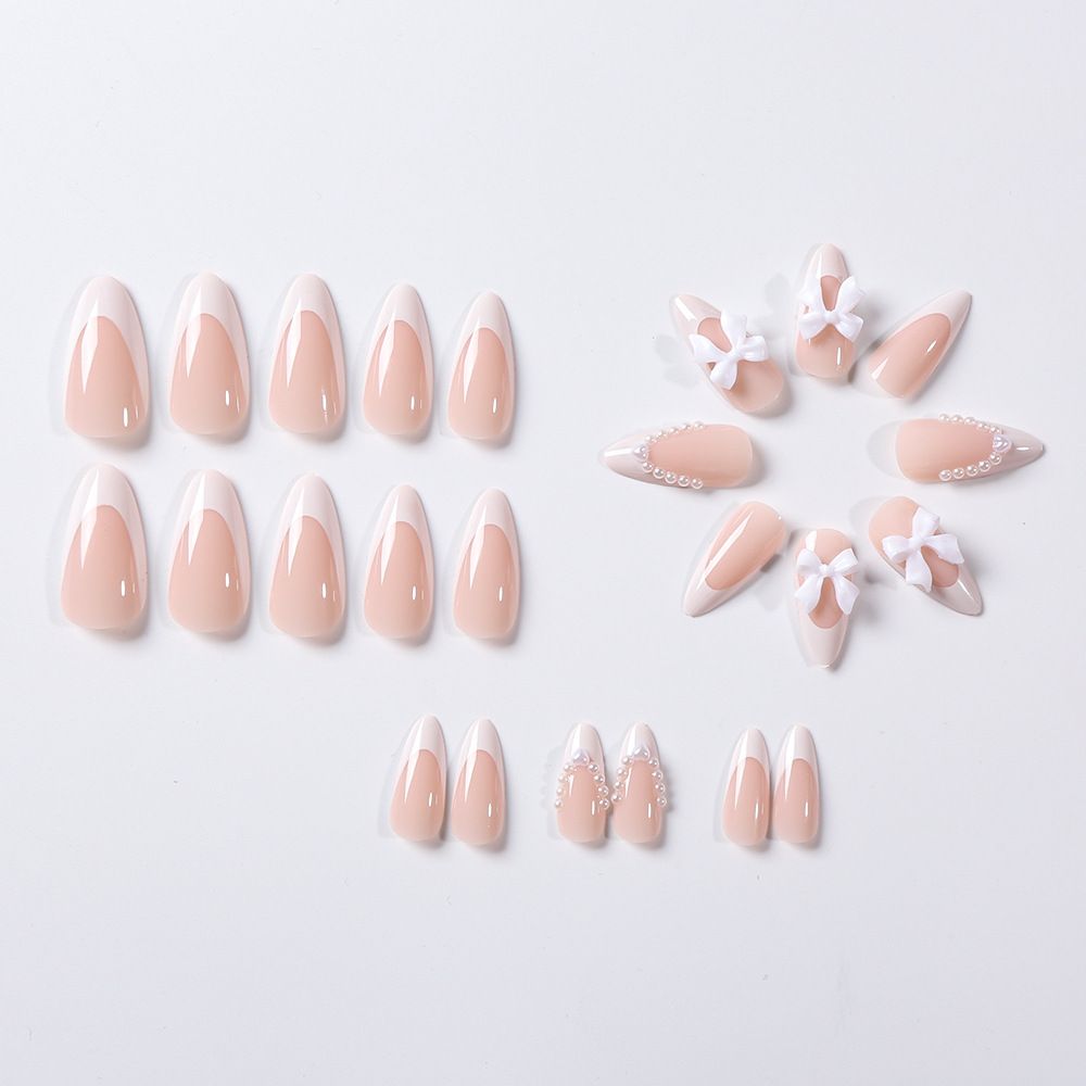 24 pieces of French white border nude pink nail art pieces, butterfly knot pearl wearable nail, detachable almond nail art pieces wholesale