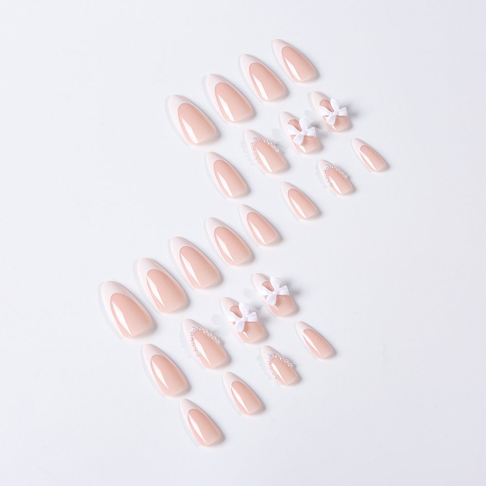 24 pieces of French white border nude pink nail art pieces, butterfly knot pearl wearable nail, detachable almond nail art pieces wholesale