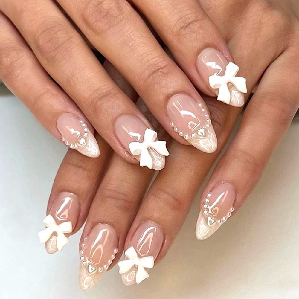 24 pieces of French white border nude pink nail art pieces, butterfly knot pearl wearable nail, detachable almond nail art pieces wholesale
