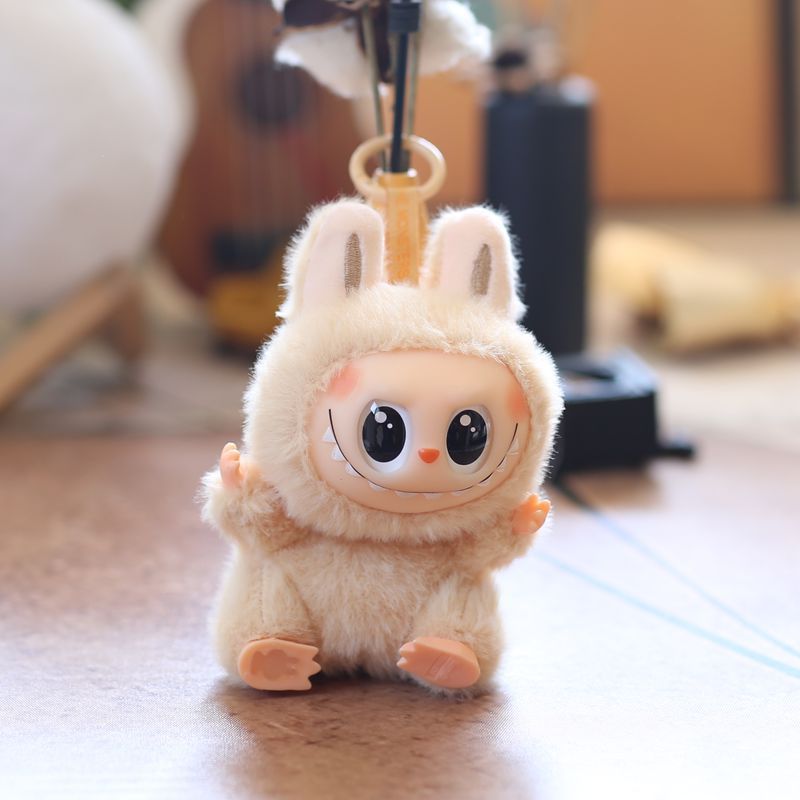 Height 15cm, rotatable silicone plushie bib pendant plush toy doll. Super cute plush cartoon bib.