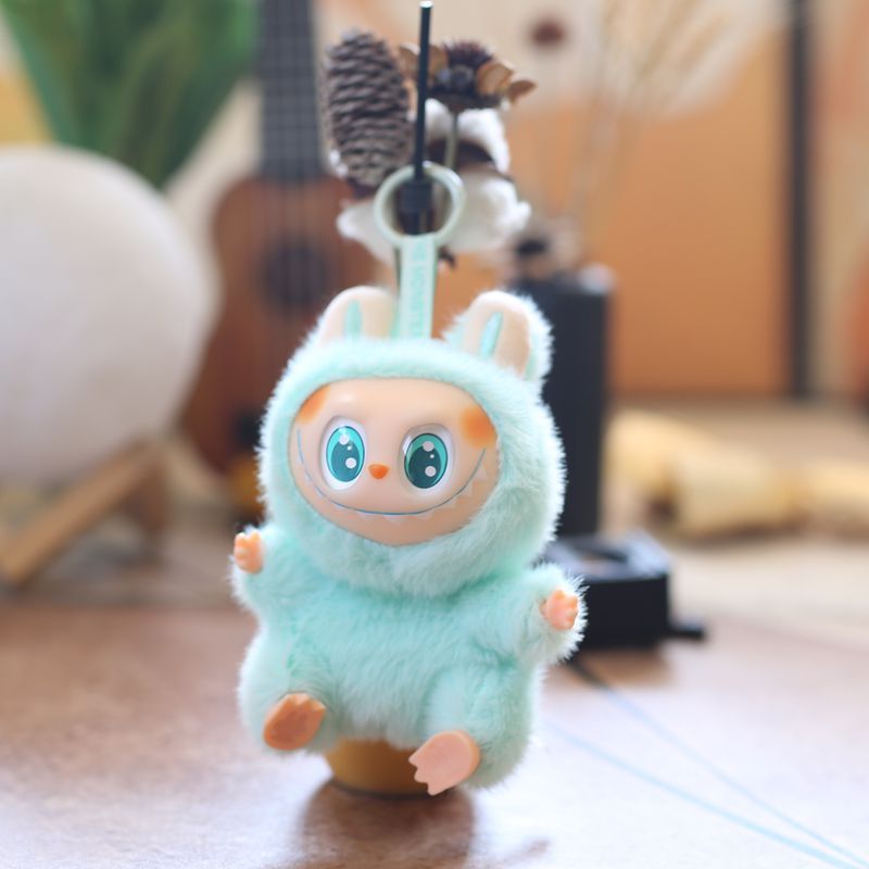 Height 15cm, rotatable silicone plushie bib pendant plush toy doll. Super cute plush cartoon bib.