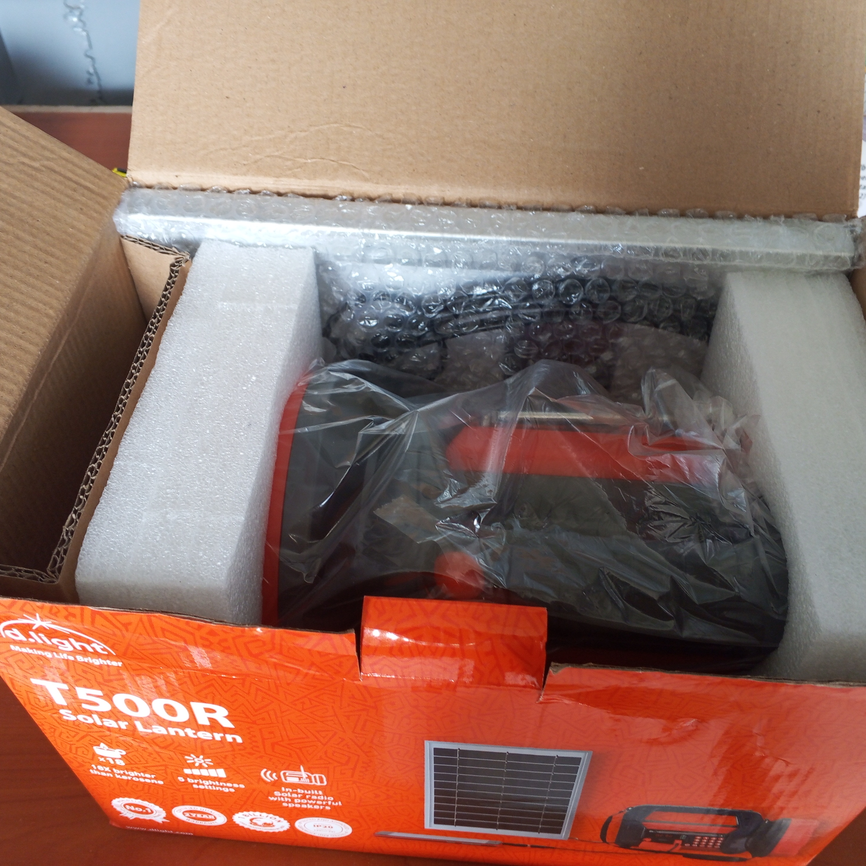 T500 solar lantern with a radio, side lamp, charger and a charging solar.