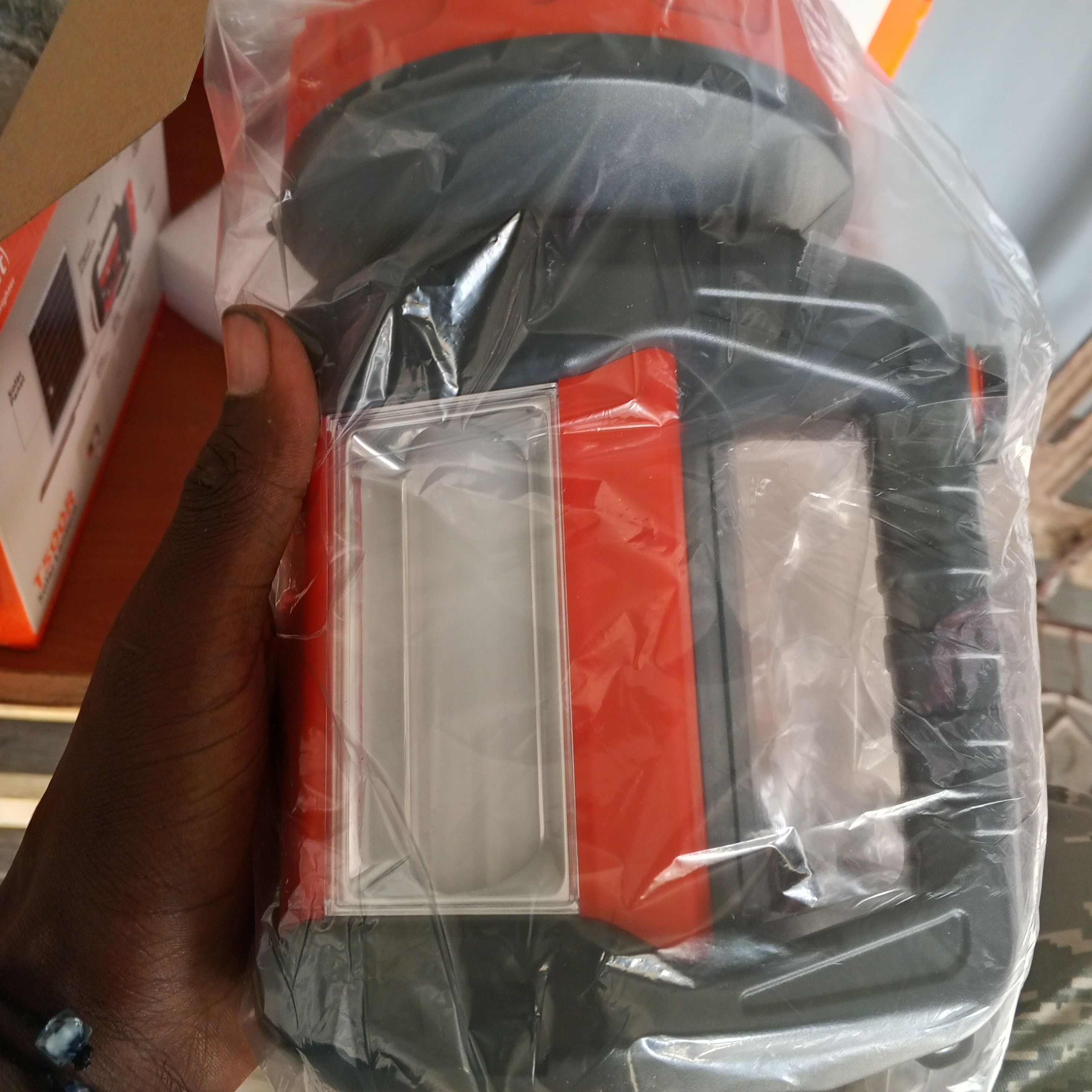 T500 solar lantern with a radio, side lamp, charger and a charging solar.