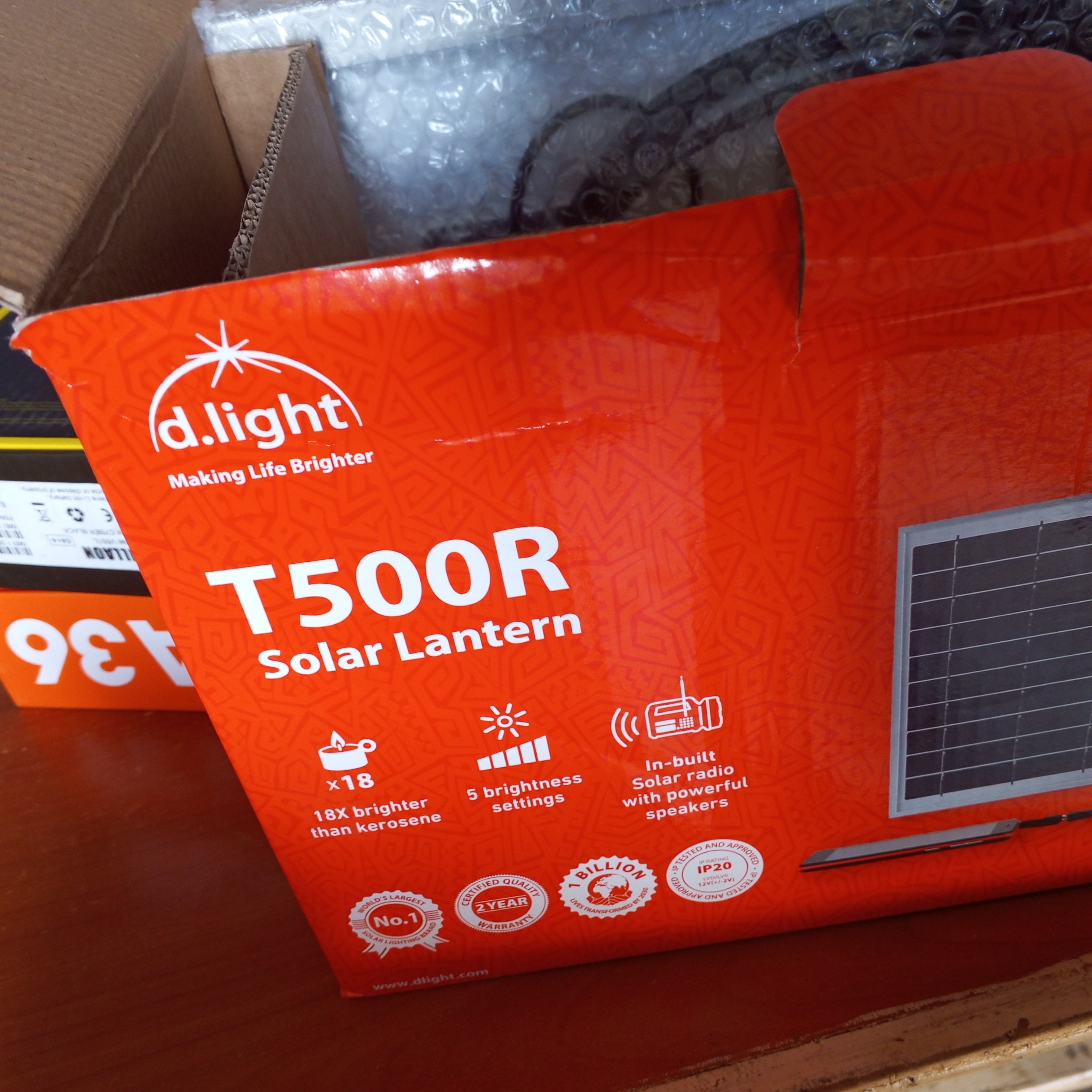 T500 solar lantern with a radio, side lamp, charger and a charging solar.