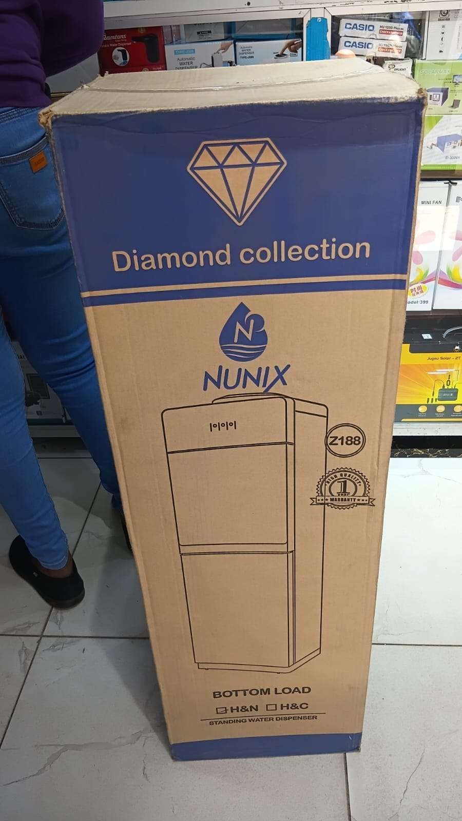Nunix Z188 Bottom Load Water Dispenser - Hot & Normal water dispenser, Water container cabinet at the bottom