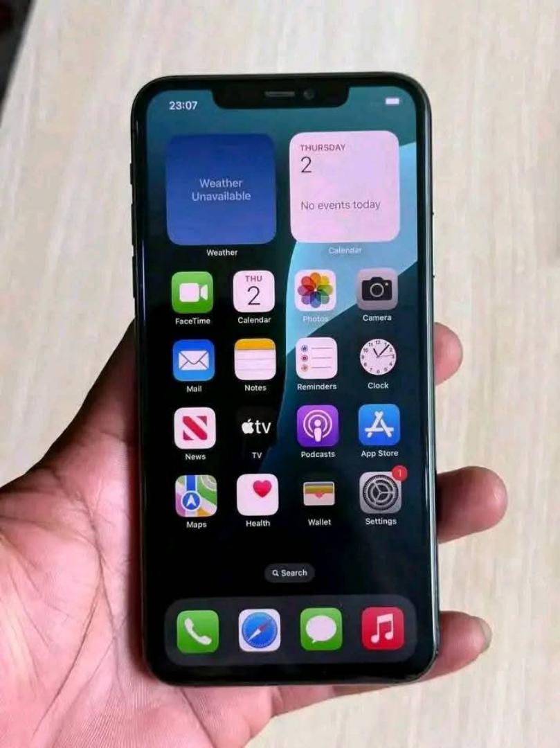 Apple iPhone 12 Mini 256GB 4GB RAM 5G Speed A14 Bionic 5.4" Super Retina XDR OLED iOS 14.1 Dual 12MP Camera 2227mAh Fast Charging Battery Pre-Owned Abroad 6 Months Warranty The smartphone runs iOS 14