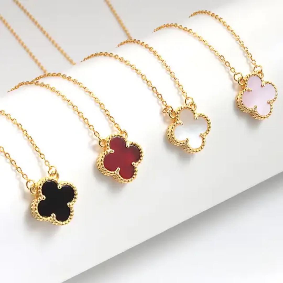 Bestselling 4-leaf clover pendant necklace features a gold-coated design, symbolizing luck and positivity. A perfect accessory for any occasion, it adds a touch of charm and elegance to your style.