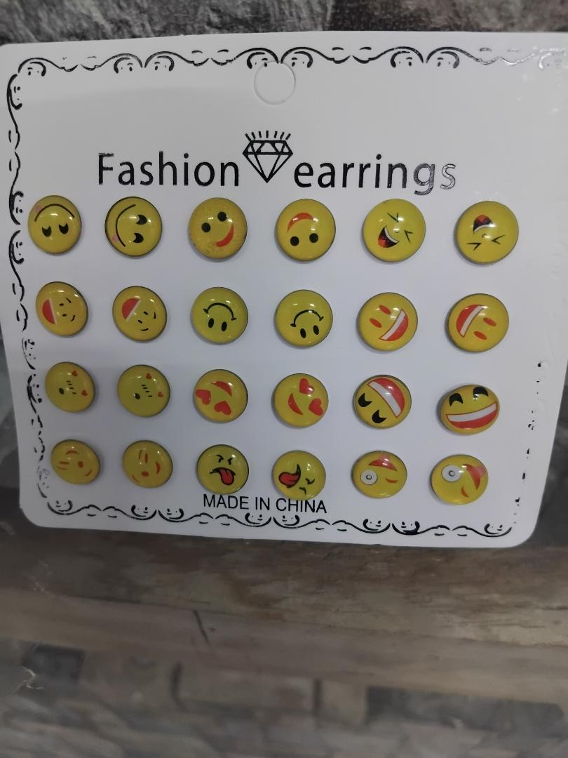 12 pairs of emoji fashion stud earrings features hypoallergenic, stainless steel construction that’s non-tarnish. Perfect for everyday wear, they add fun and style while ensuring comfort a