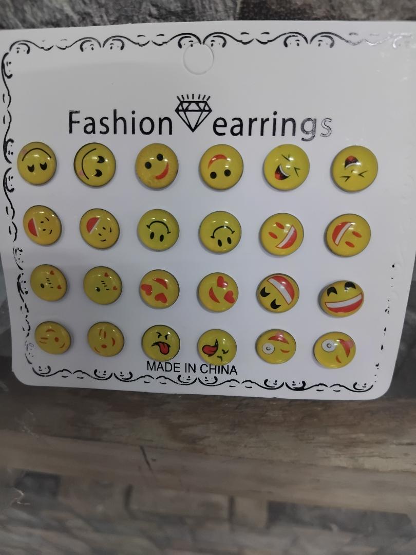 12 pairs of emoji fashion stud earrings features hypoallergenic, stainless steel construction that’s non-tarnish. Perfect for everyday wear, they add fun and style while ensuring comfort a