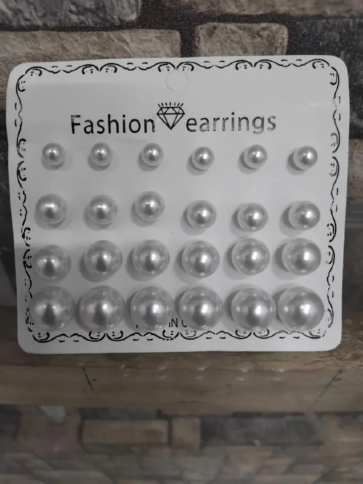 12-pair set of white pearl stud earrings is perfect for wedding occasions. Featuring mixed sizes, hypoallergenic design, and tarnish-resistant materials, these elegant studs offer timeless beauty