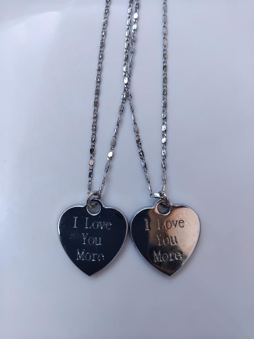 "Love You Couple Necklace Set - Silver Non-Tarnish Stainless Steel Chains with 'Love You More' Pendant - Durable & Stylish His and Hers Necklace Set for Couples"