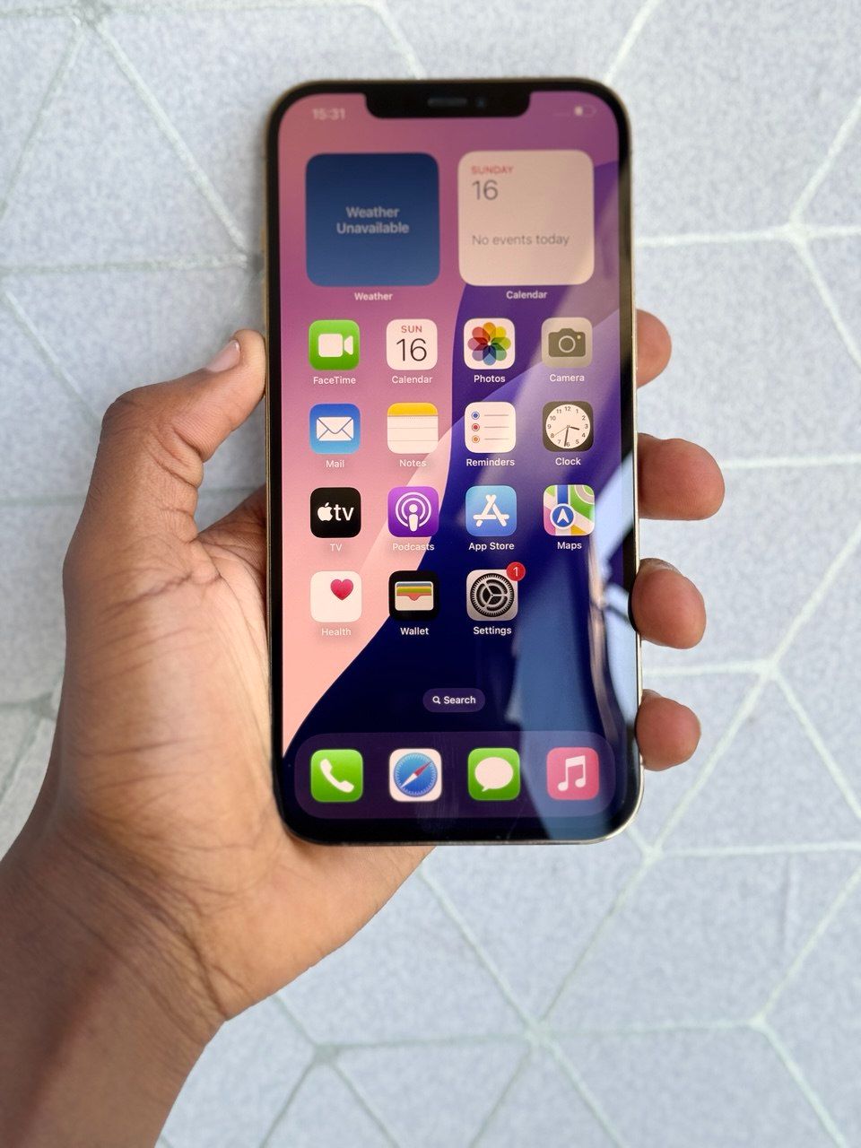 New IPHONE 12 PRO MAX IN GOLD WITH 256GB OF STORAGE. A 6.7-INCH SUPER RETINA XDR DISPLAY A PERFECTLY WORKING FACE ID AND TRUETONE ENABLED 90% BATTERY CAPACITY.