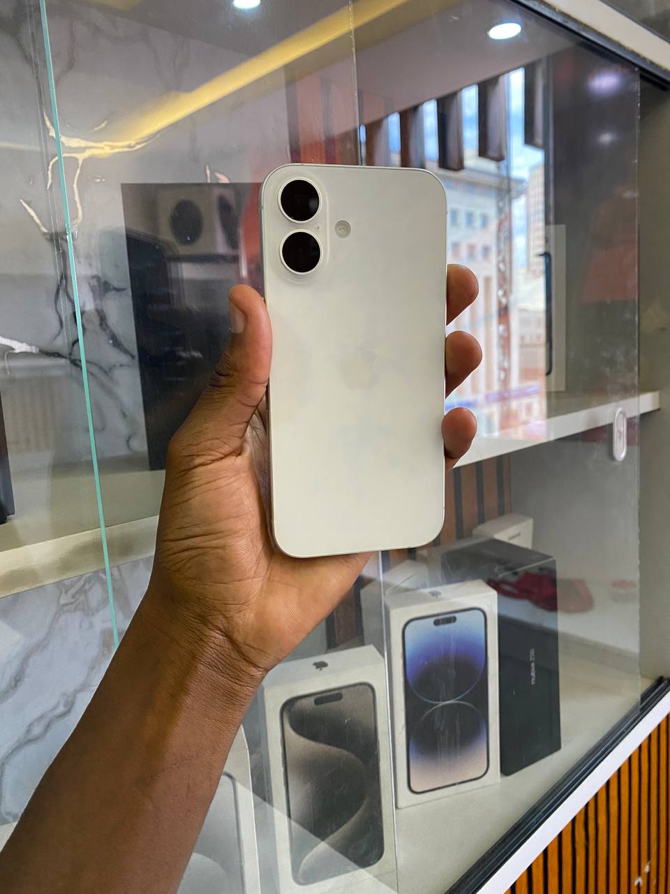 IPHONE 16 IS APPLE’S NEW SMARTPHONE WITH A FAST CHIP, IMPROVED CAMERAS, BETTER BATTERY LIFE, AND NEW AI FEATURES. IT RUNS IOS AND OFFERS A SMOOTH, HIGH-QUALITY DESIGN AND PERFORMANCE FOR EVERYDAY USE.