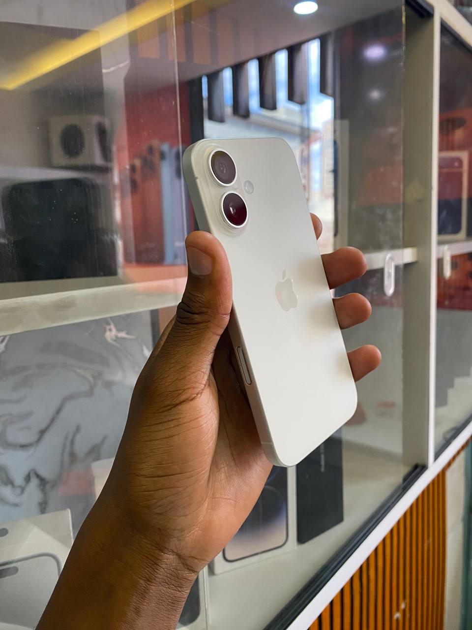 IPHONE 16 IS APPLE’S NEW SMARTPHONE WITH A FAST CHIP, IMPROVED CAMERAS, BETTER BATTERY LIFE, AND NEW AI FEATURES. IT RUNS IOS AND OFFERS A SMOOTH, HIGH-QUALITY DESIGN AND PERFORMANCE FOR EVERYDAY USE.