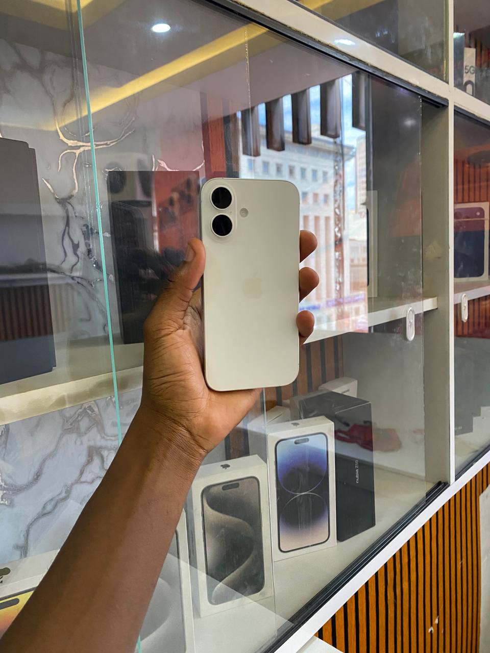 IPHONE 16 IS APPLE’S NEW SMARTPHONE WITH A FAST CHIP, IMPROVED CAMERAS, BETTER BATTERY LIFE, AND NEW AI FEATURES. IT RUNS IOS AND OFFERS A SMOOTH, HIGH-QUALITY DESIGN AND PERFORMANCE FOR EVERYDAY USE.