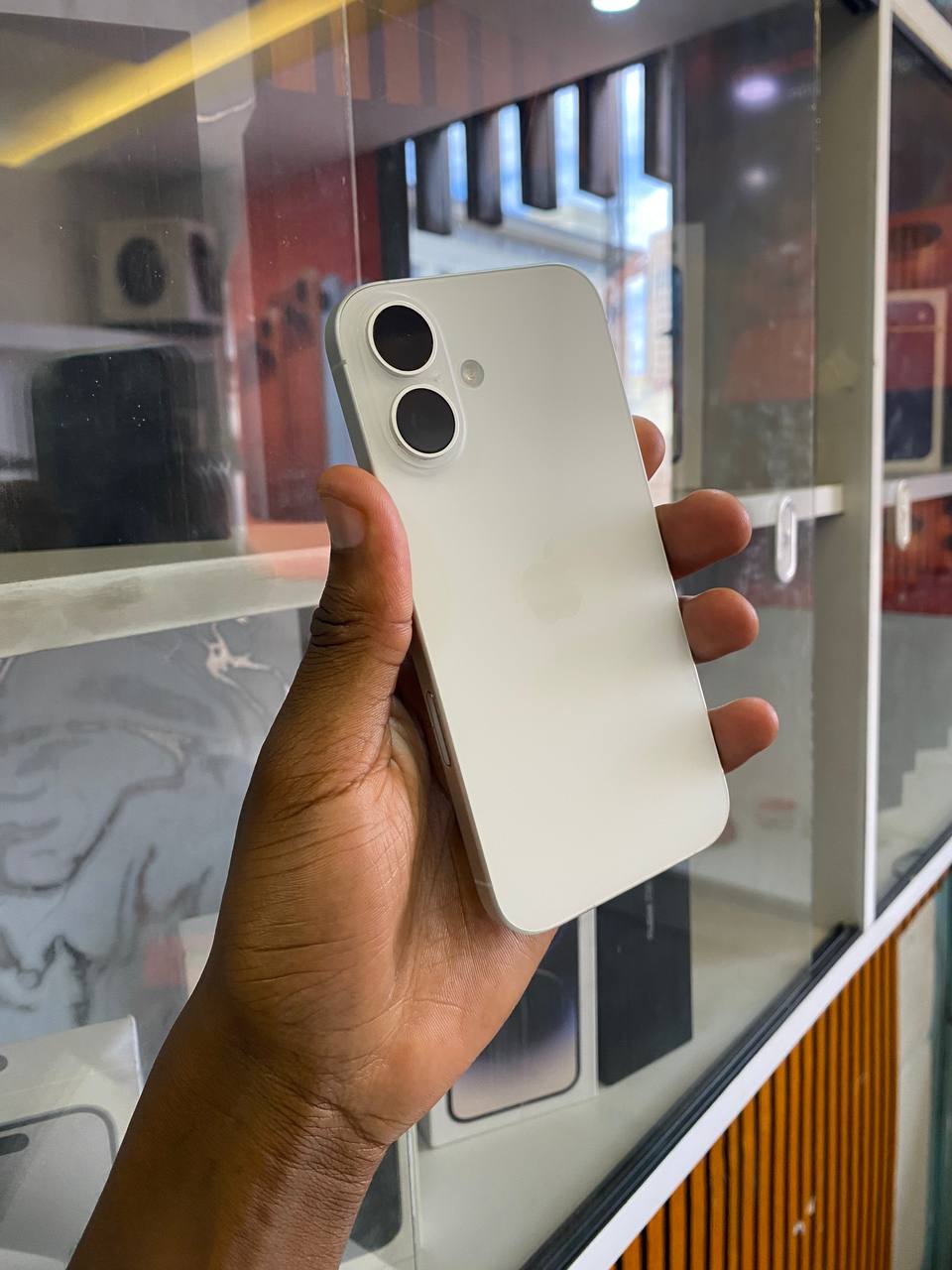 IPHONE 16 IS APPLE’S NEW SMARTPHONE WITH A FAST CHIP, IMPROVED CAMERAS, BETTER BATTERY LIFE, AND NEW AI FEATURES. IT RUNS IOS AND OFFERS A SMOOTH, HIGH-QUALITY DESIGN AND PERFORMANCE FOR EVERYDAY USE.