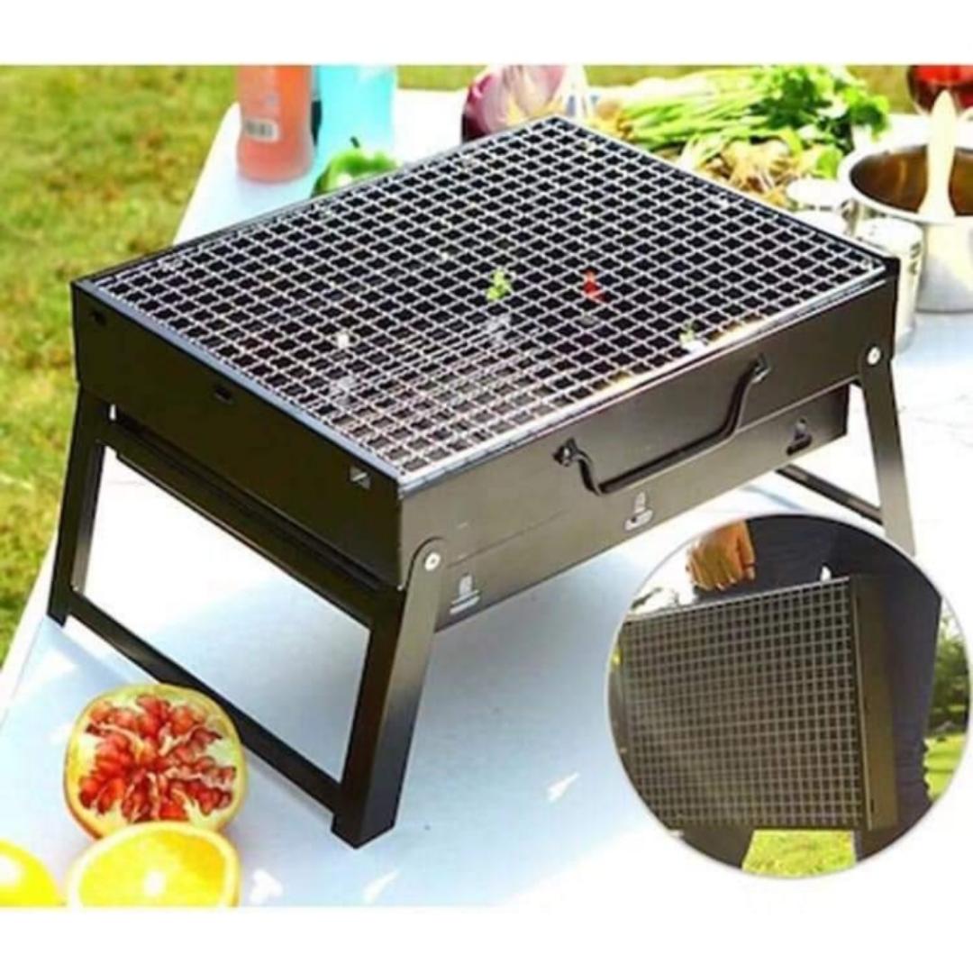 NEW !! Foldable Portable barbecue charcoal grill.