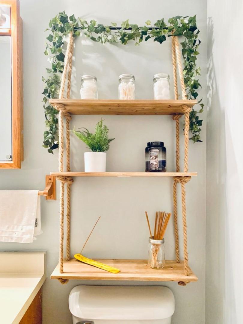 Three tiers of natural  wood floating shelves Durable rope for a rustic, suspended look