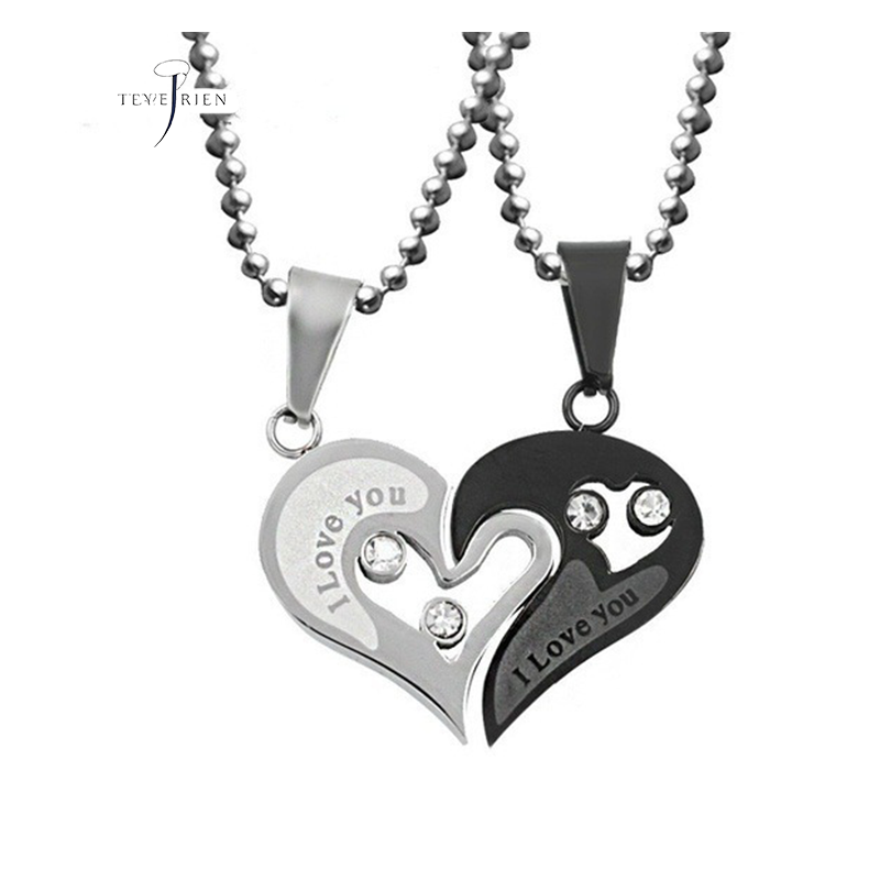 A pair of heart-shaped diamond-encrusted pendants with a bead chain love couple necklace