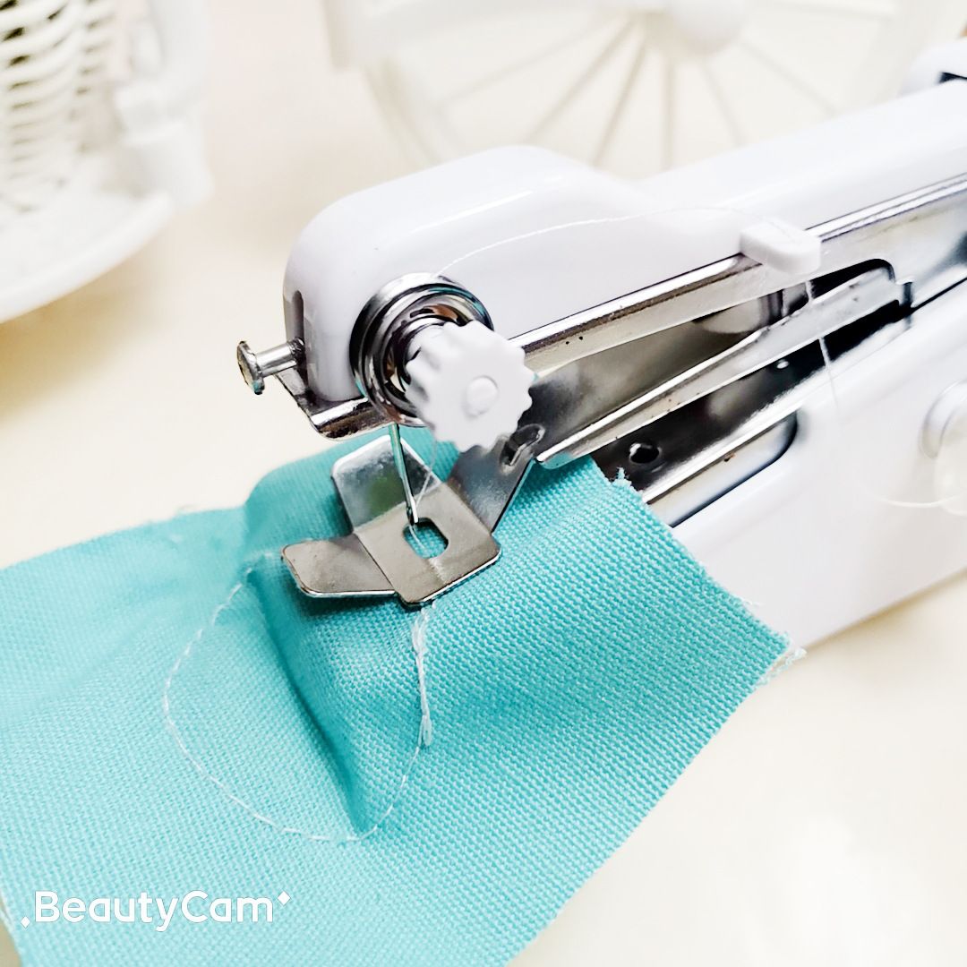 Portable household micro handheld electric sewing machine Mini manual sewing machine