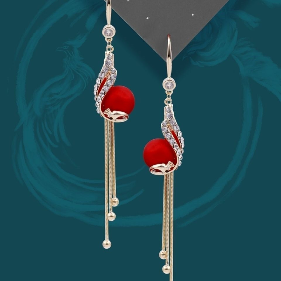 New cat eye stone tassel earrings for women with a high-end and elegant temperament. Long earrings with fashionable and versatile hooks and earrings