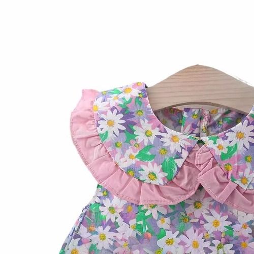 A stylish floral print dress for baby girls in summer, a cute cotton dress, and a princess dress with a bag