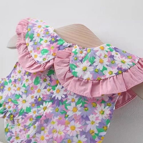 A stylish floral print dress for baby girls in summer, a cute cotton dress, and a princess dress with a bag