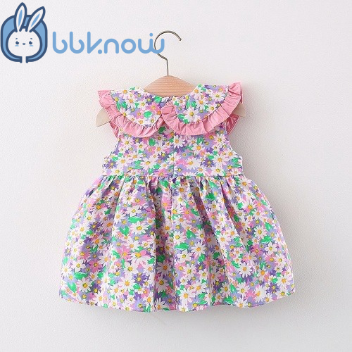 A stylish floral print dress for baby girls in summer, a cute cotton dress, and a princess dress with a bag