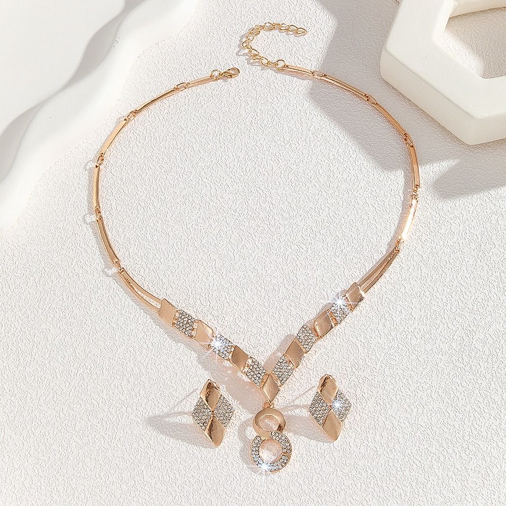 Hot Gold Zinc Alloy Inlaid 2025 Africa Europe America White Rhinestone Metal 8-figure Necklace Earrings Rhinestone Metal Ieopard Head Necklace Earrings Water Drop Necklace Earrings Set Women's Jewelry