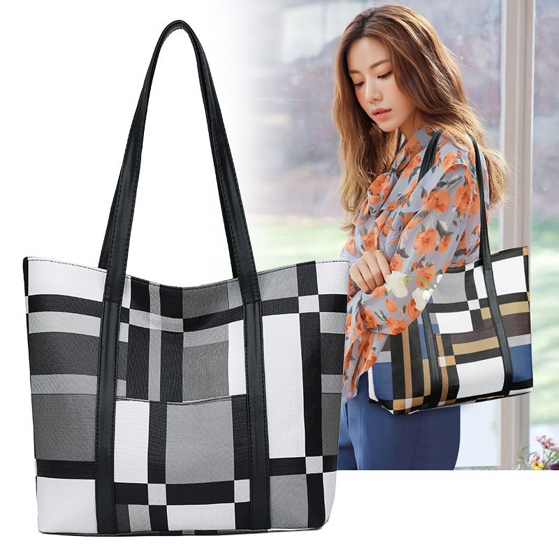 Tote bag, women's bag, spliced leather large capacity bag, 2025 new fashion, spring and summer women's single shoulder handbag