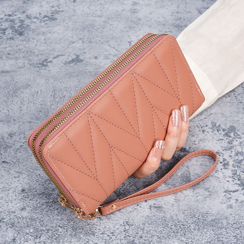 New wallet, European and American retro long style zero wallet, large capacity women's multi card zipper hand-held mobile phone bag