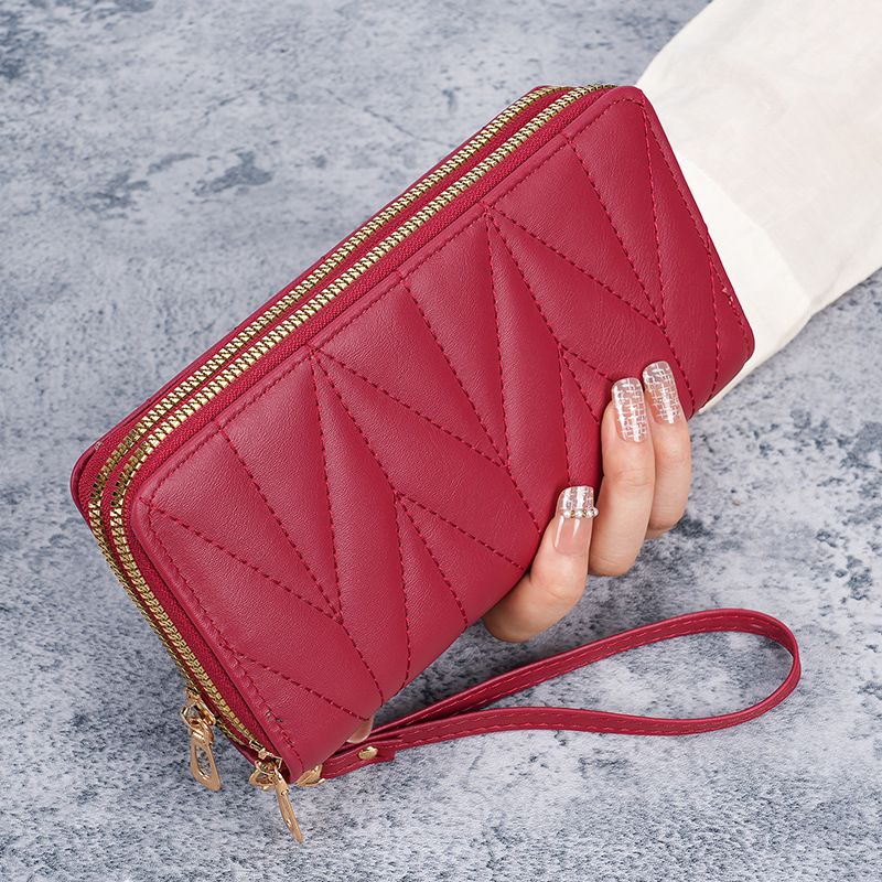 New wallet, European and American retro long style zero wallet, large capacity women's multi card zipper hand-held mobile phone bag