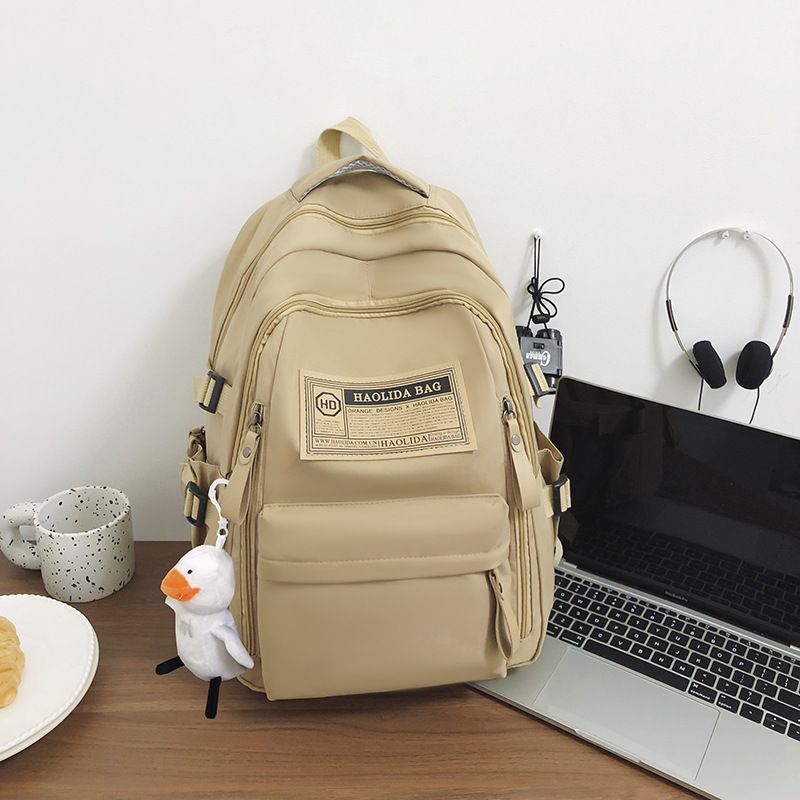 Backpack for women, simple travel in autumn and winter, computer backpack for men, high school and middle school students, large capacity