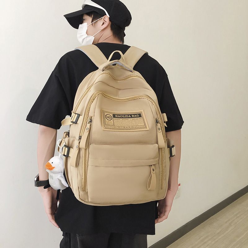 Backpack for women, simple travel in autumn and winter, computer backpack for men, high school and middle school students, large capacity