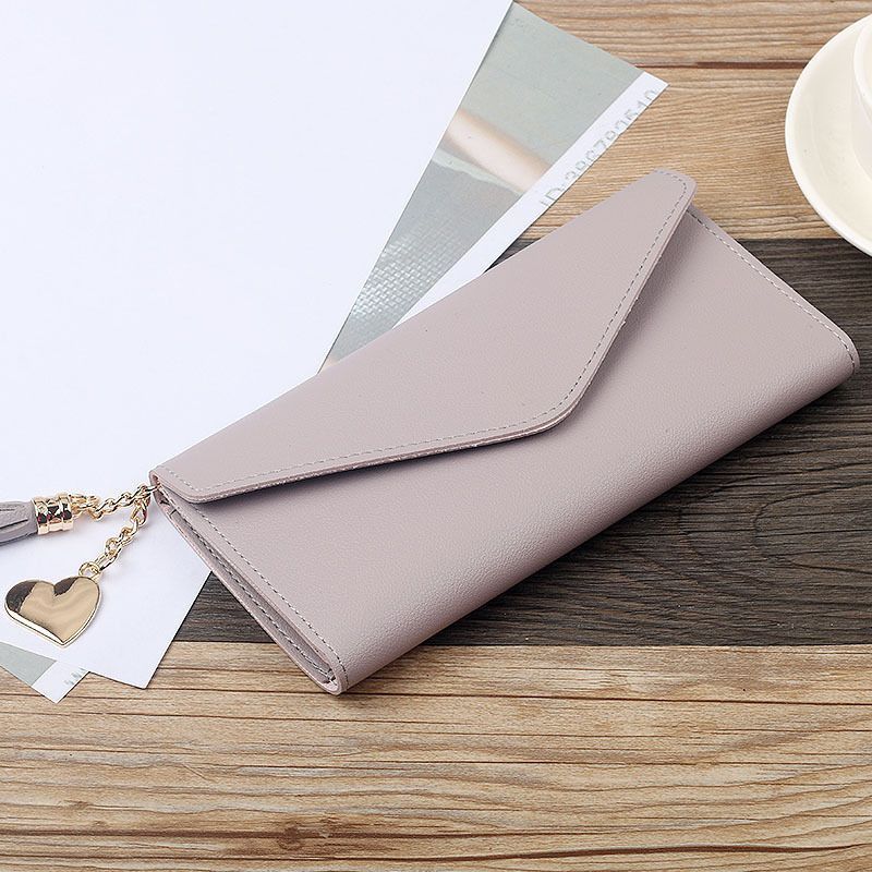 Fashion long tassel wallet for women, 30% off for female students, large capacity change card bag, simple Korean version, hand-held bag, wallet