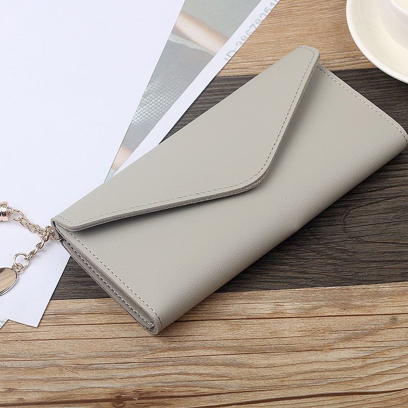 Fashion long tassel wallet for women, 30% off for female students, large capacity change card bag, simple Korean version, hand-held bag, wallet