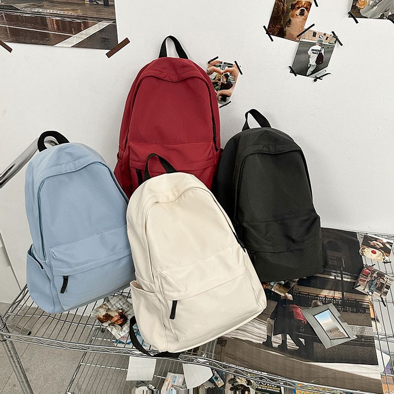Japanese style unprinted backpack for male and female college students, Korean version, large capacity solid color backpack, middle and high school student backpack
