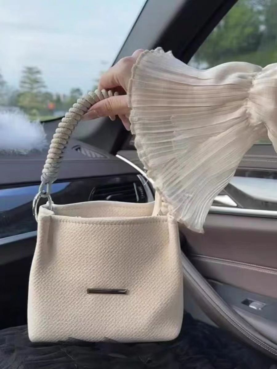 New spring and summer canvas niche design, high-end sense, simple and versatile, bucket chain, hand-held crossbody bag for women