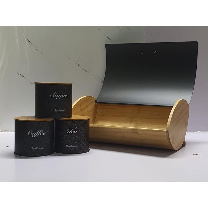 BREAD STORAGE BIN WOODEN SUPPORT with 3 pcs TEA COFFEE AND SUGAR ALLOY CANISTERSNew * bread storage bin wooden support with 3pcs canisters

material :alloy coloured 

colours: white granite and black
