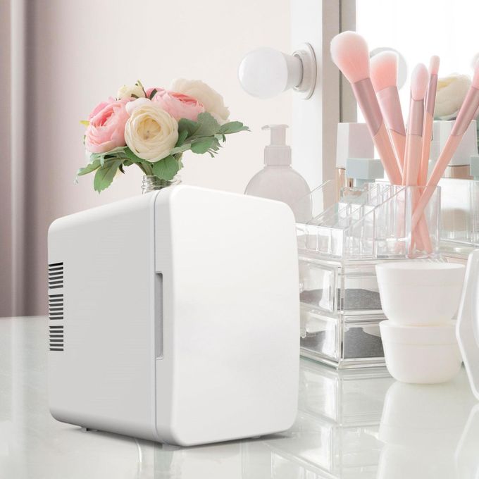 Mini Fridge Adjustable Temperature Makeup Fridge For White4L Mini Fridge is made of PP material, which is lightweight and strong.【Save Space】: Mini fridge has 4 Liter capacity, compact size