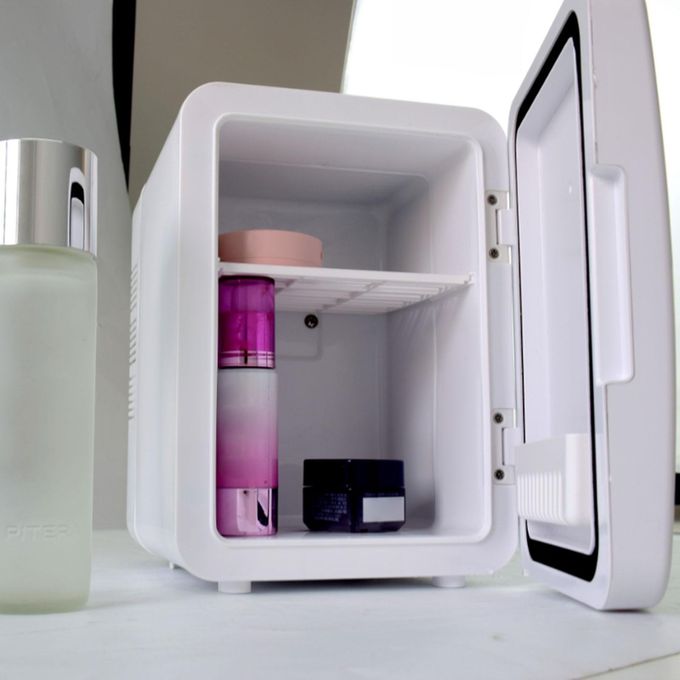 Mini Fridge Adjustable Temperature Makeup Fridge For White4L Mini Fridge is made of PP material, which is lightweight and strong.【Save Space】: Mini fridge has 4 Liter capacity, compact size