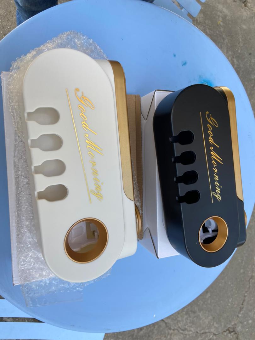 TOOTHPASTE DISPENSER, AUTOMATIC TOOTHPASTE DISPENSER, SPACE-SAVING TOOTHBRUSH HOLDER WALL MOUNTED FOR BATHROOM, TOOTHPASTE SQUEEZER, ELECTRIC TOOTHPASTE DISPENSER WITH 4 TOOTHBRUSH SLOTS