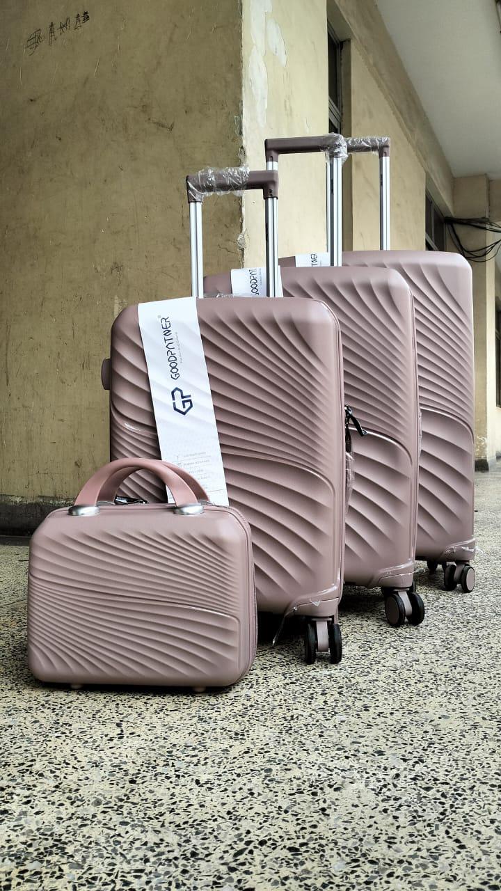 4-in-1 unbreakable luggage set -lightweight rubber travel suitcase with cosmetic bag and spinner wheels