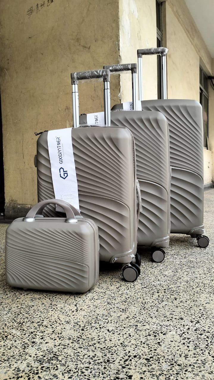 4-in-1 unbreakable luggage set -lightweight rubber travel suitcase with cosmetic bag and spinner wheels