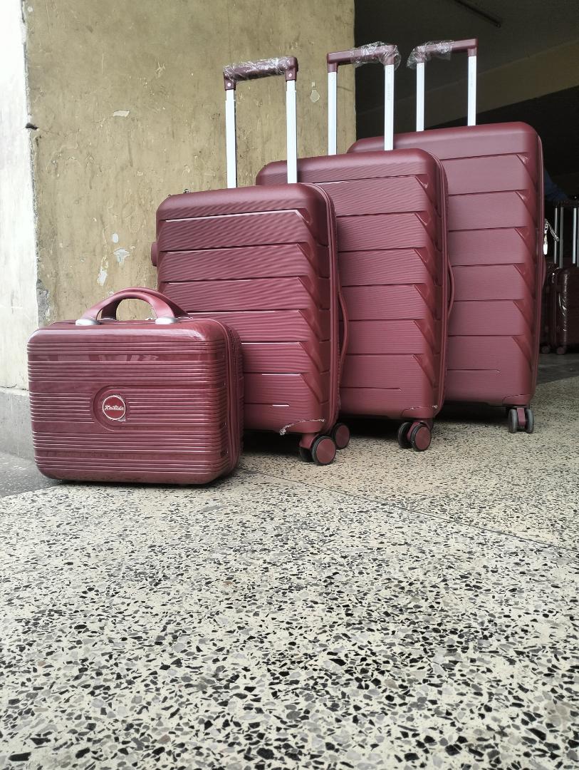 4-in-1 unbreakable luggage set -lightweight rubber travel suitcase with cosmetic bag and spinner wheels