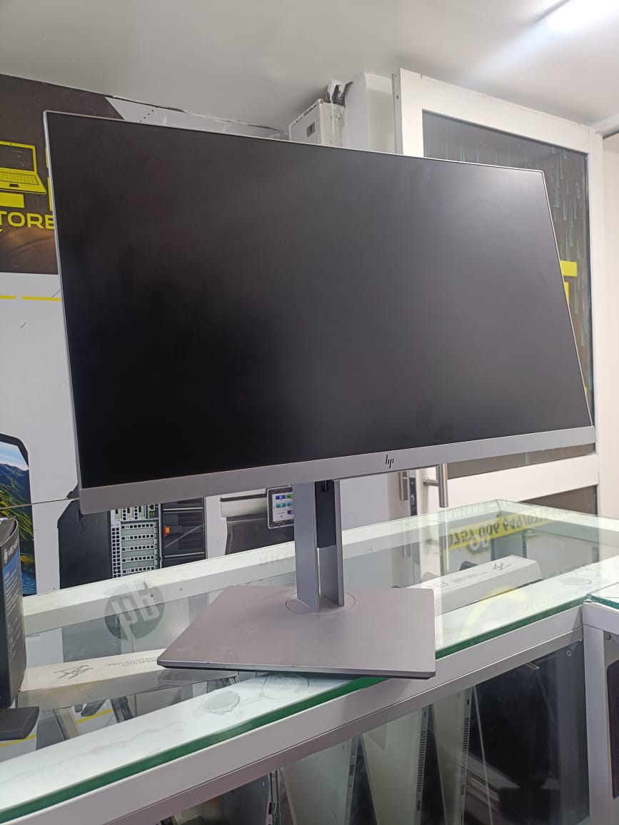 The HP EliteDisplay E243 is a sleek, high-performance 23.8-inch Full HD monitor, designed for productivity and comfort. With ultra-thin bezels and a 3-sided micro-edge display, it offers a seamless