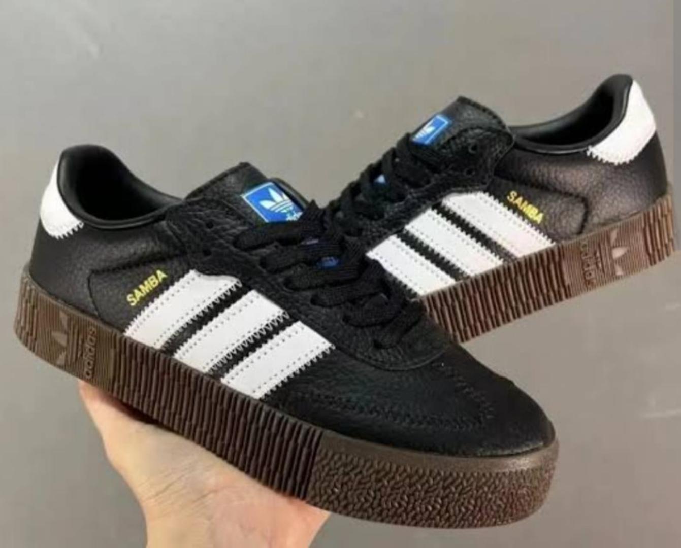 "ADIDAS SAMBA Double sole Quality Leather Unisex Sneakers: Expertly crafted with premium leather, offering timeless style and comfort for both men and women. Perfect for casual and everyday wear."